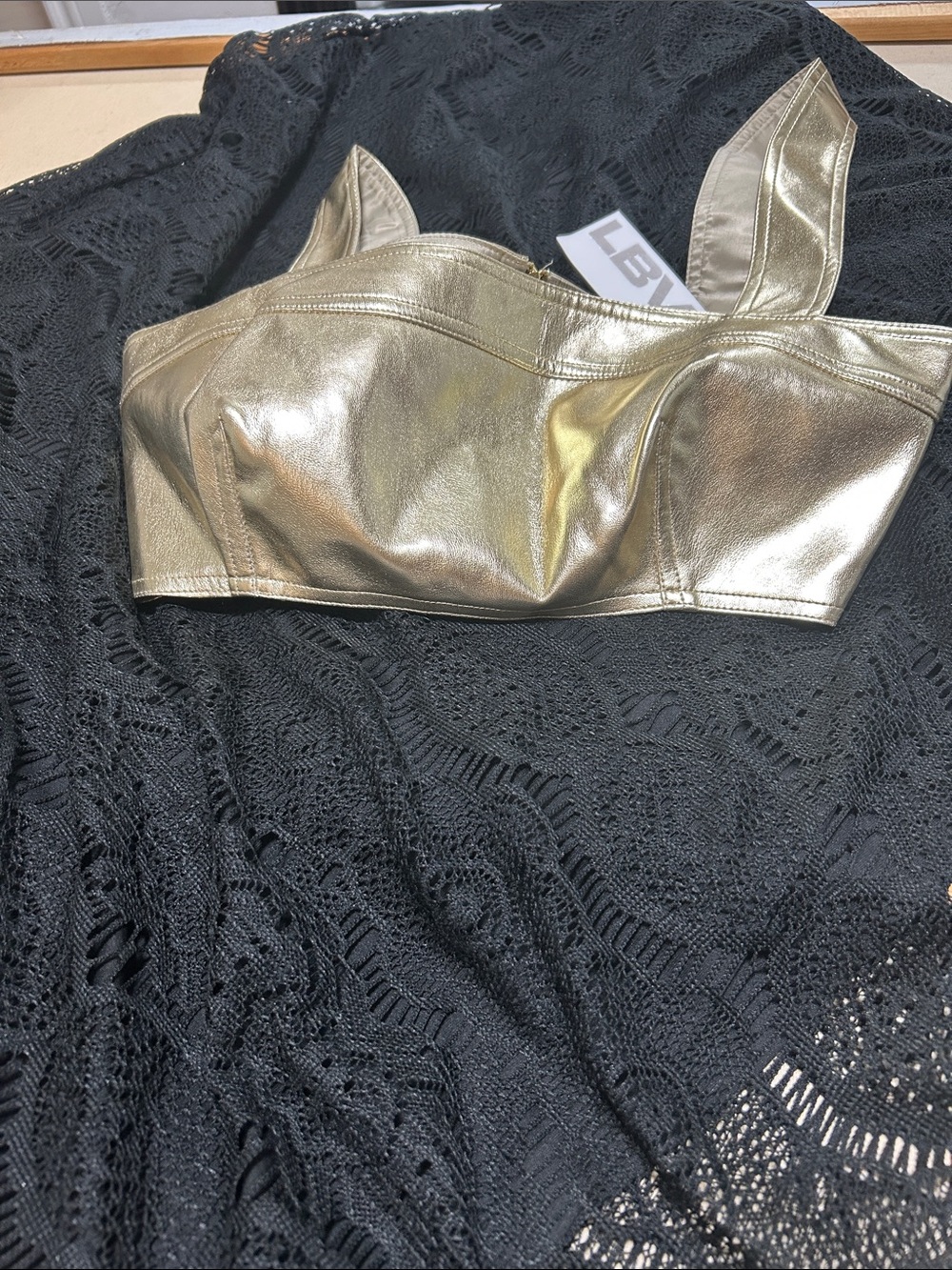LBV METALLIC VEGAN LEATHER BRA iN GOLD.